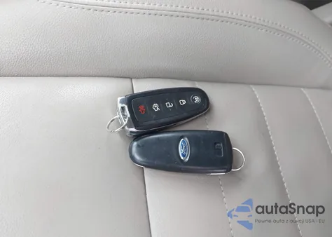 2014 Ford Escape Titanium z USA, uszkodzony, nr VIN 1FMCU9JX9EUC20380